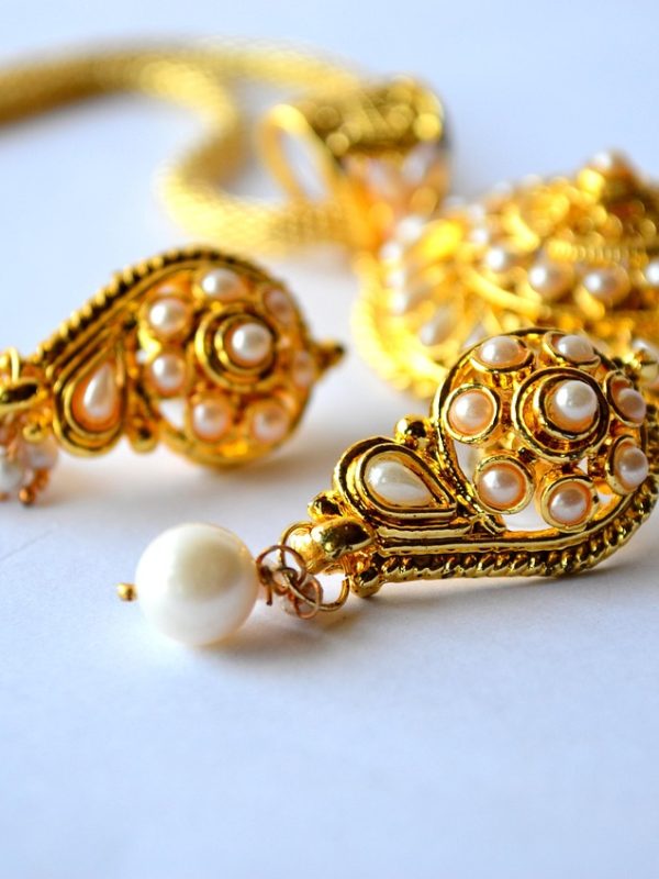 Woman wearing layered jewelry